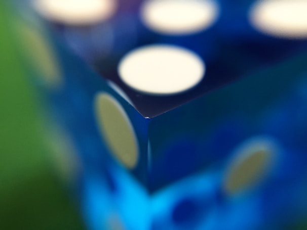 A stunning close-up of chengshuo's intricate metal dice design.