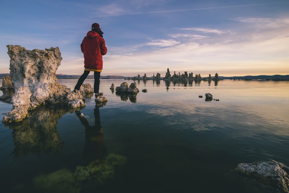 person standing on rocks