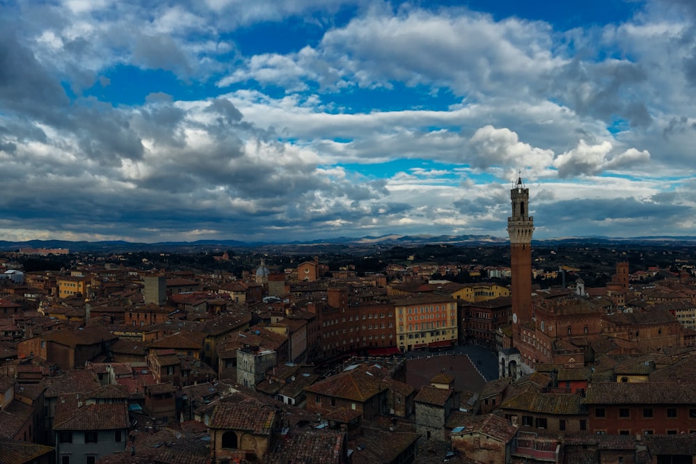 aerial view of buildings under clouded sky