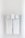 Two neatly folded white towels hang from a clean, white towel rack against a plain, light-colored wall.
