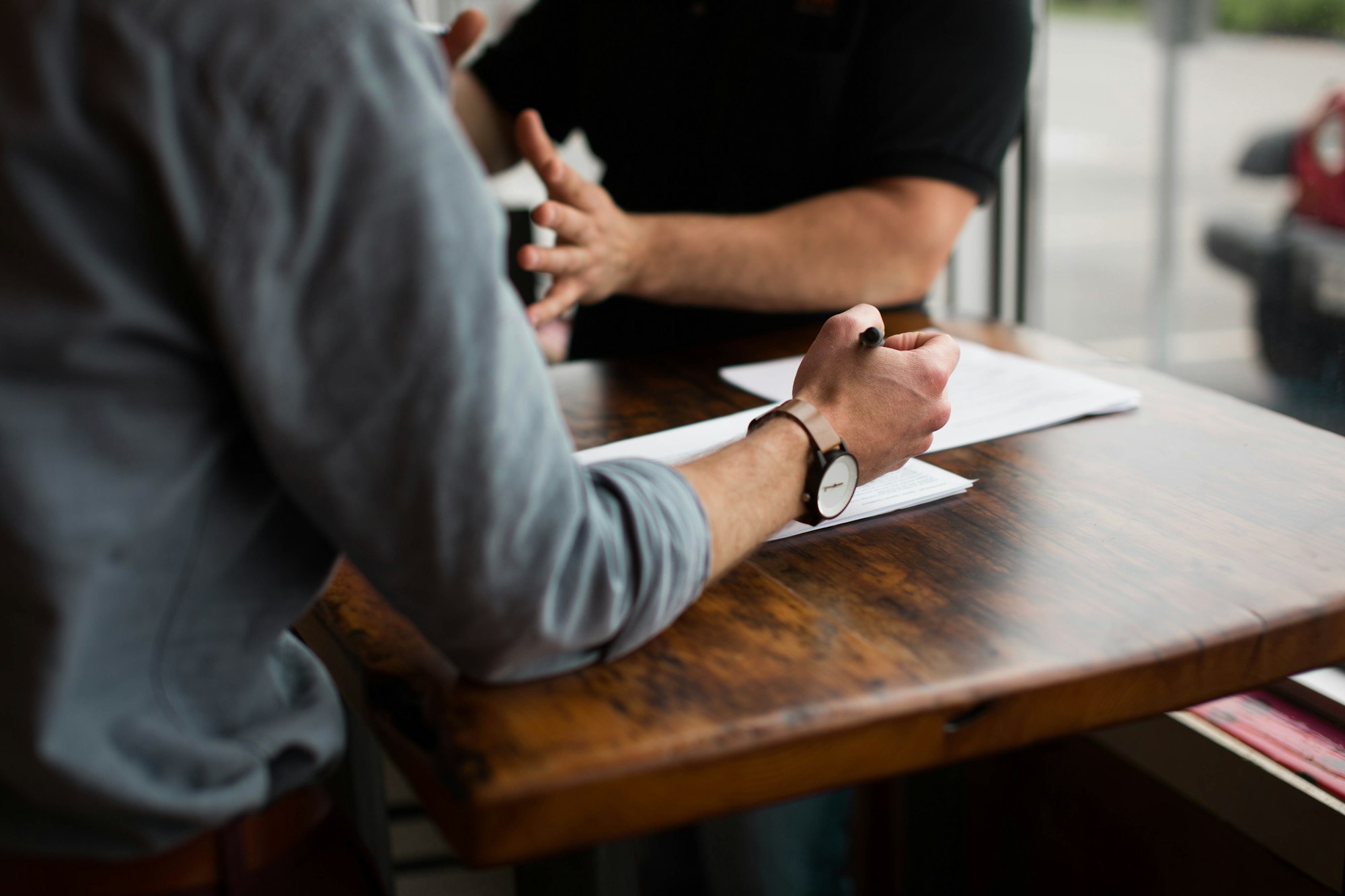 Me and my film crew were setting up for a basic interview. Before the interviewee sat down for the camera, the interviewer went over some questions with him. They proceeded to bounce ideas off of each other and had an energetic brainstorm.