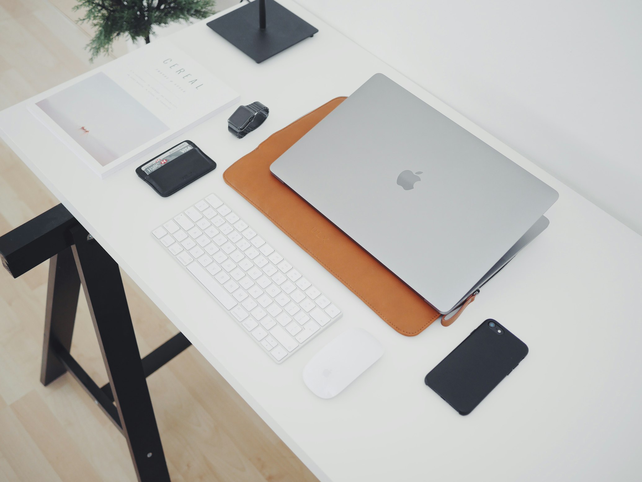 Workspace with laptop and charts
