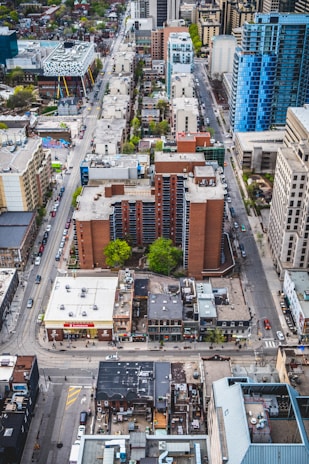 An aerial view of a bustling commercial district showcasing diverse real estate options.