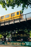 yellow and black train on rail