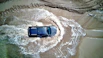 top view photography of pickup truck in puddle of water