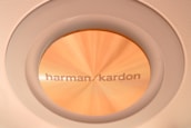 Close-up of a premium speaker cone with subtle light reflections emphasizing details.