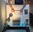 A person using a laptop to fill out an online form with a clean and organized workspace.