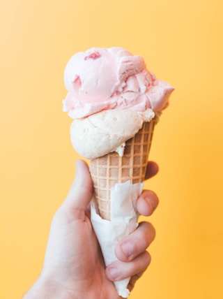 strawberry ice cream on cone