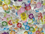 Colorful stickers arranged on a flat surface for display.