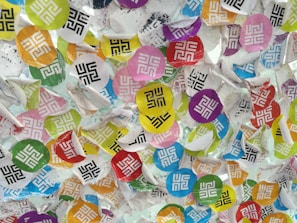 Colorful stickers arranged on a flat surface for display.