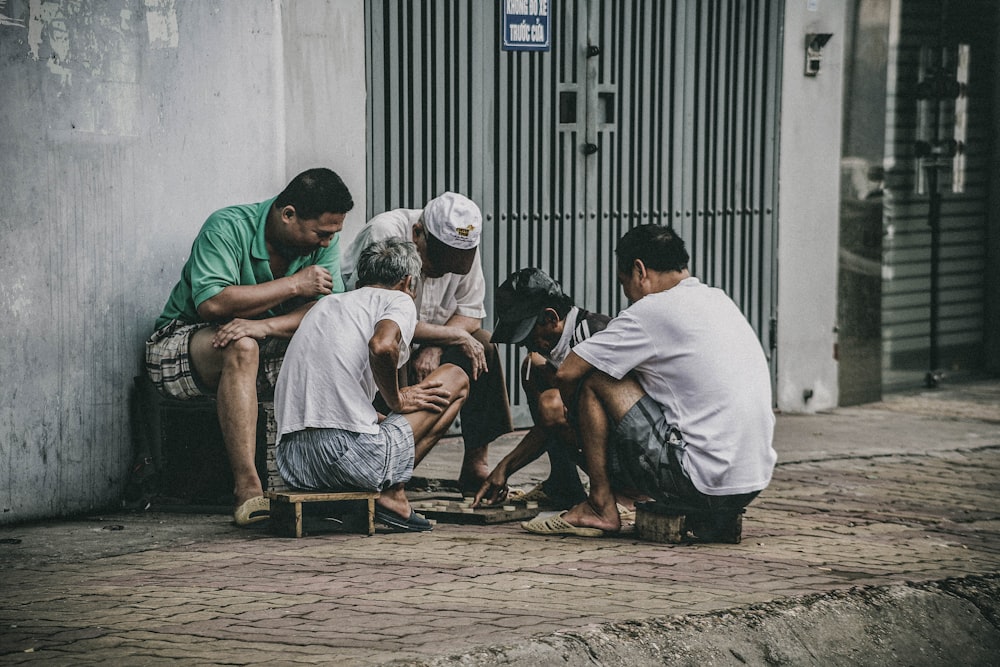 people playing beside street