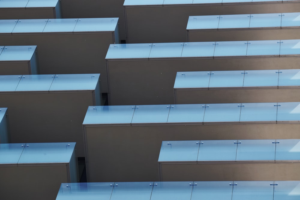 low-angle photography of gray high-rise building