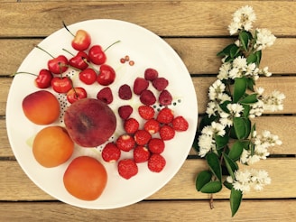 A wooden table adorned with fresh fruits and vegetables.