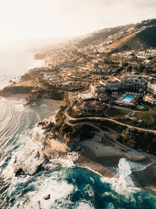 Aerial view of buildings along the water in Laguna Beach