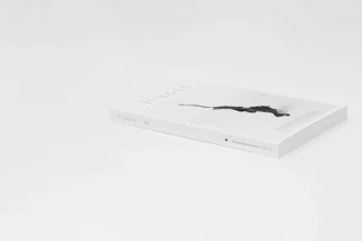 A sleek, glossy magazine spread featuring vibrant Caribbean-inspired visuals and elegant typography.