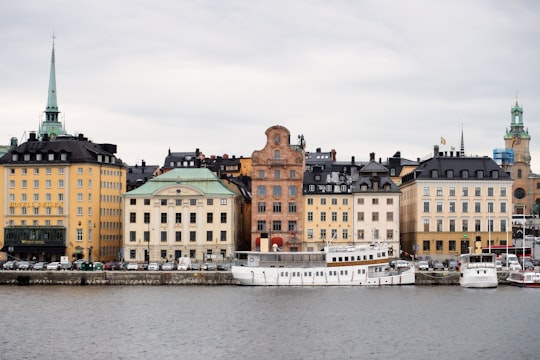 rover near road and buildings in Gamla stan Sweden