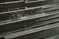 A freshly waterproofed rooftop glistening after rain, highlighting the protective coating.