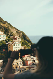 A vibrant photo of a traveler exploring a sunlit coastal village, capturing the essence of personalized journeys.