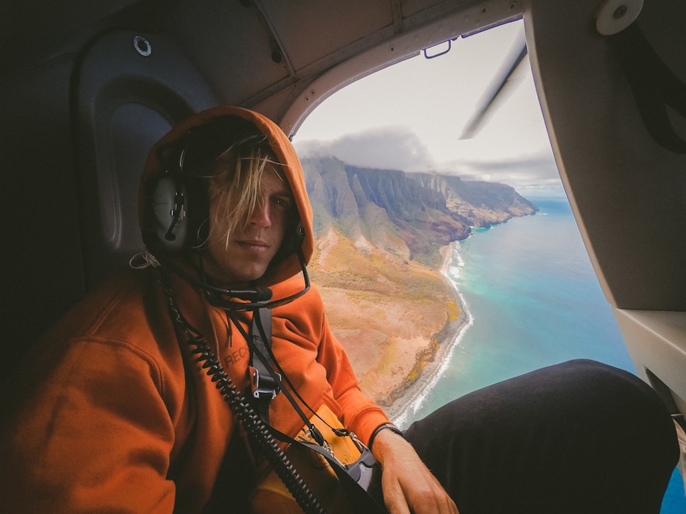 man inside the plane during daytime