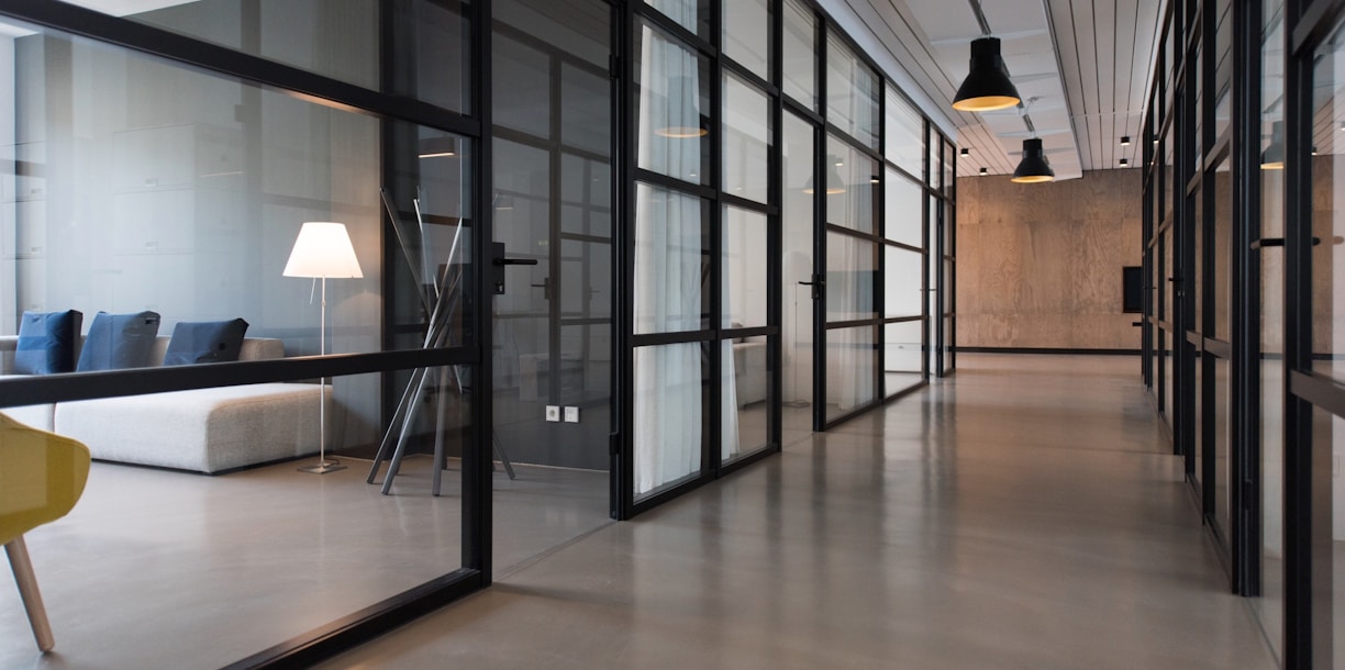 hallway between glass-panel doors