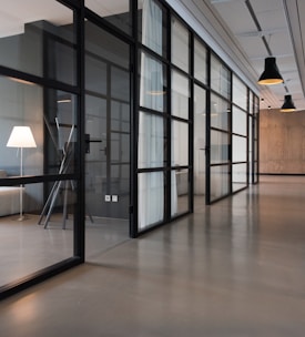 hallway between glass-panel doors