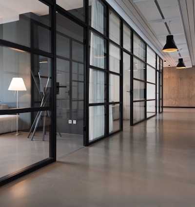 hallway between glass-panel doors