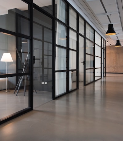 hallway between glass-panel doors