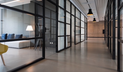 hallway between glass-panel doors