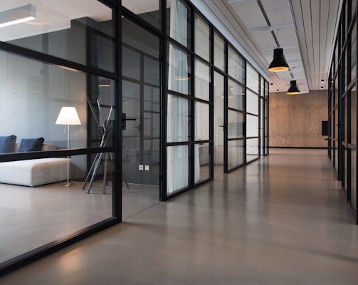 hallway between glass-panel doors