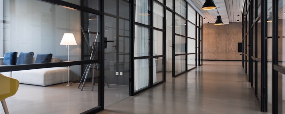 hallway between glass-panel doors