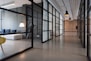 hallway between glass-panel doors