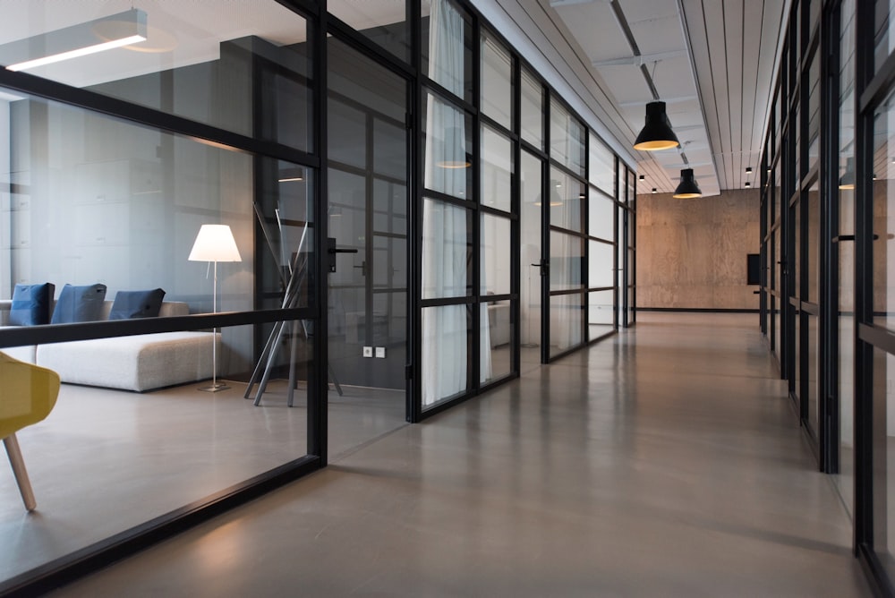 hallway between glass-panel doors