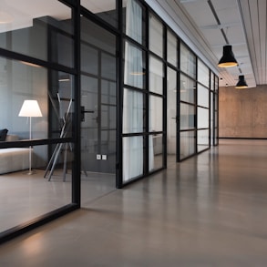 hallway between glass-panel doors