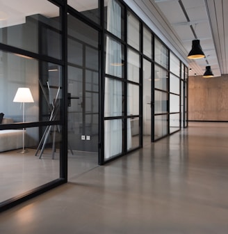 hallway between glass-panel doors