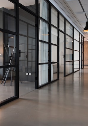 hallway between glass-panel doors