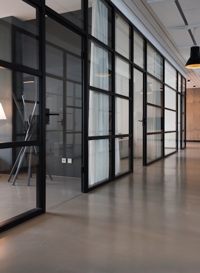 hallway between glass-panel doors