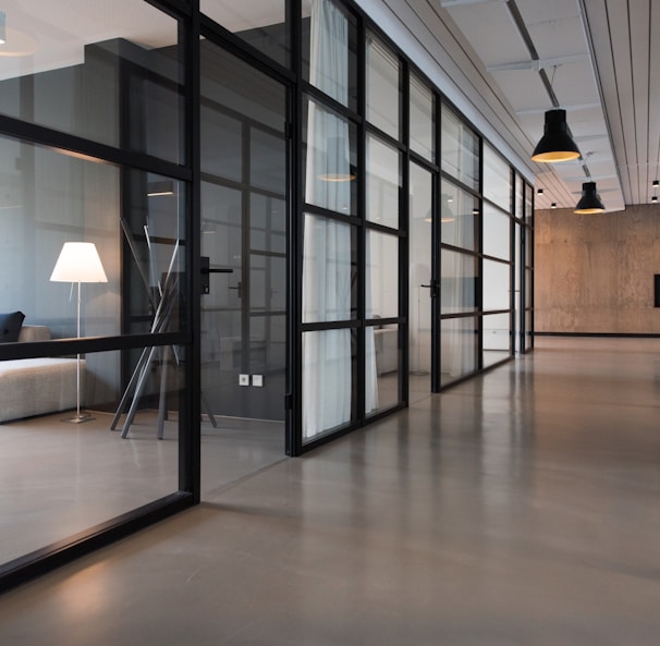 hallway between glass-panel doors