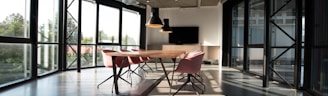 photo of dining table and chairs inside room