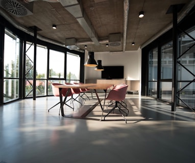 photo of dining table and chairs inside room