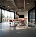 photo of dining table and chairs inside room