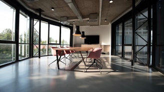 photo of dining table and chairs inside room