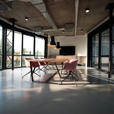 photo of dining table and chairs inside room