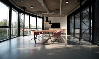 photo of dining table and chairs inside room