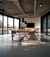 photo of dining table and chairs inside room