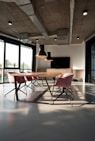 photo of dining table and chairs inside room