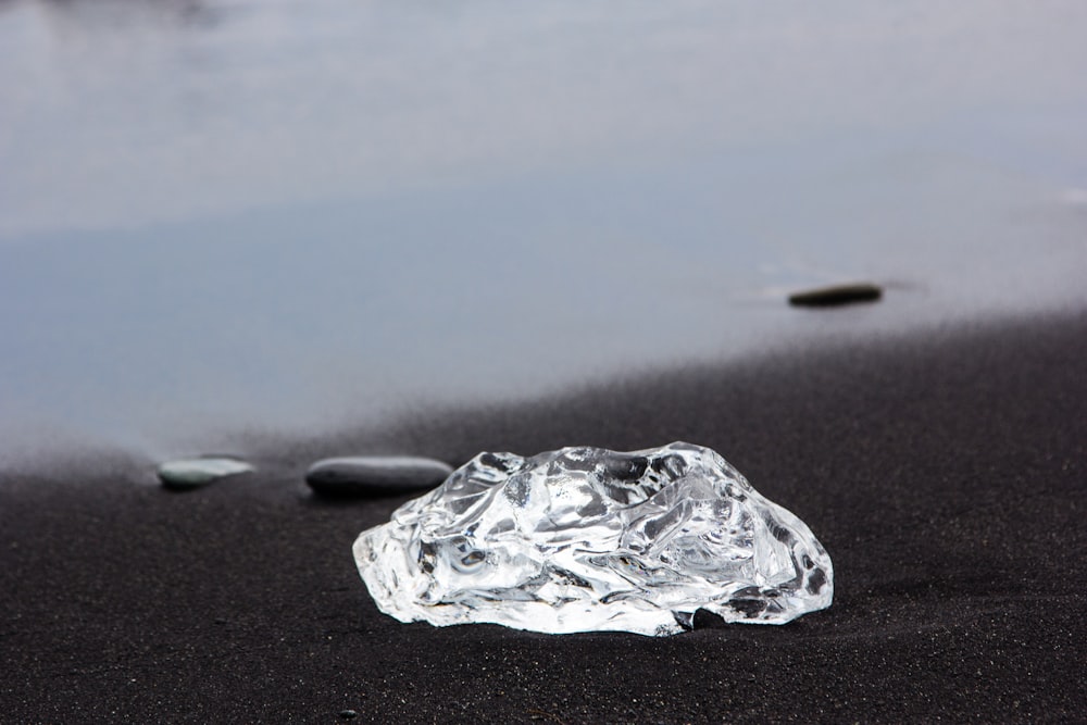 clear stone on shore at daytime