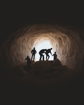 photo of people in cave