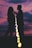 A happy couple enjoying a sunset together, symbolizing love and connection.
