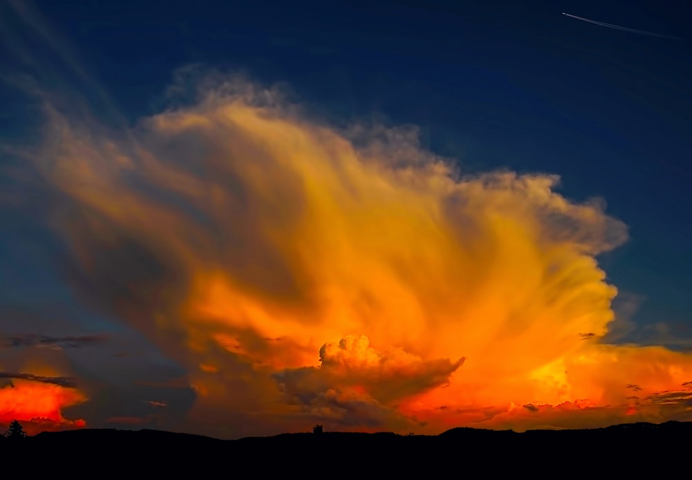 white clouds and blue sky during golden hour