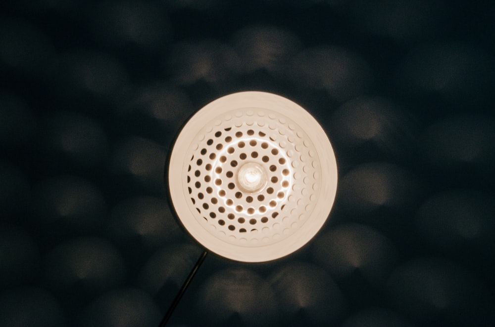 a close up of a light bulb on a black background